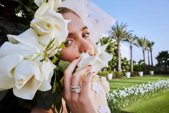 Girl in the Meadows with Flowers