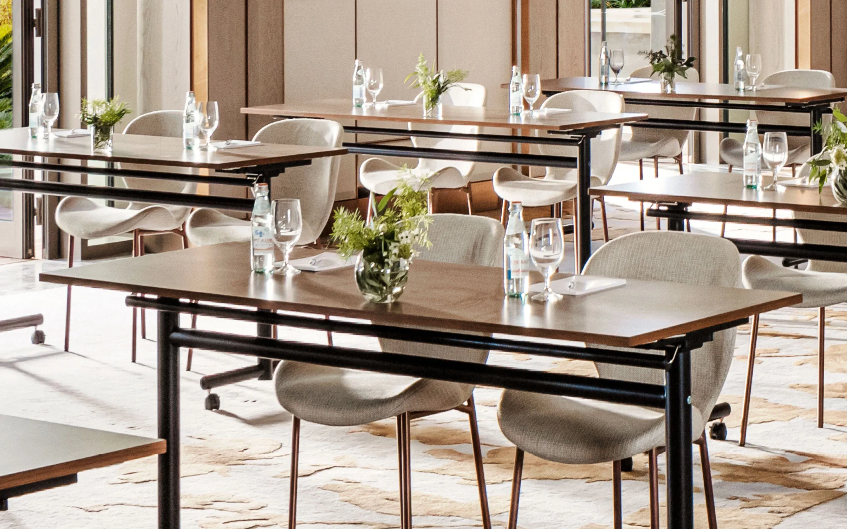 Elegantly arranged conference room with tables and chairs at One&Only Portonovi