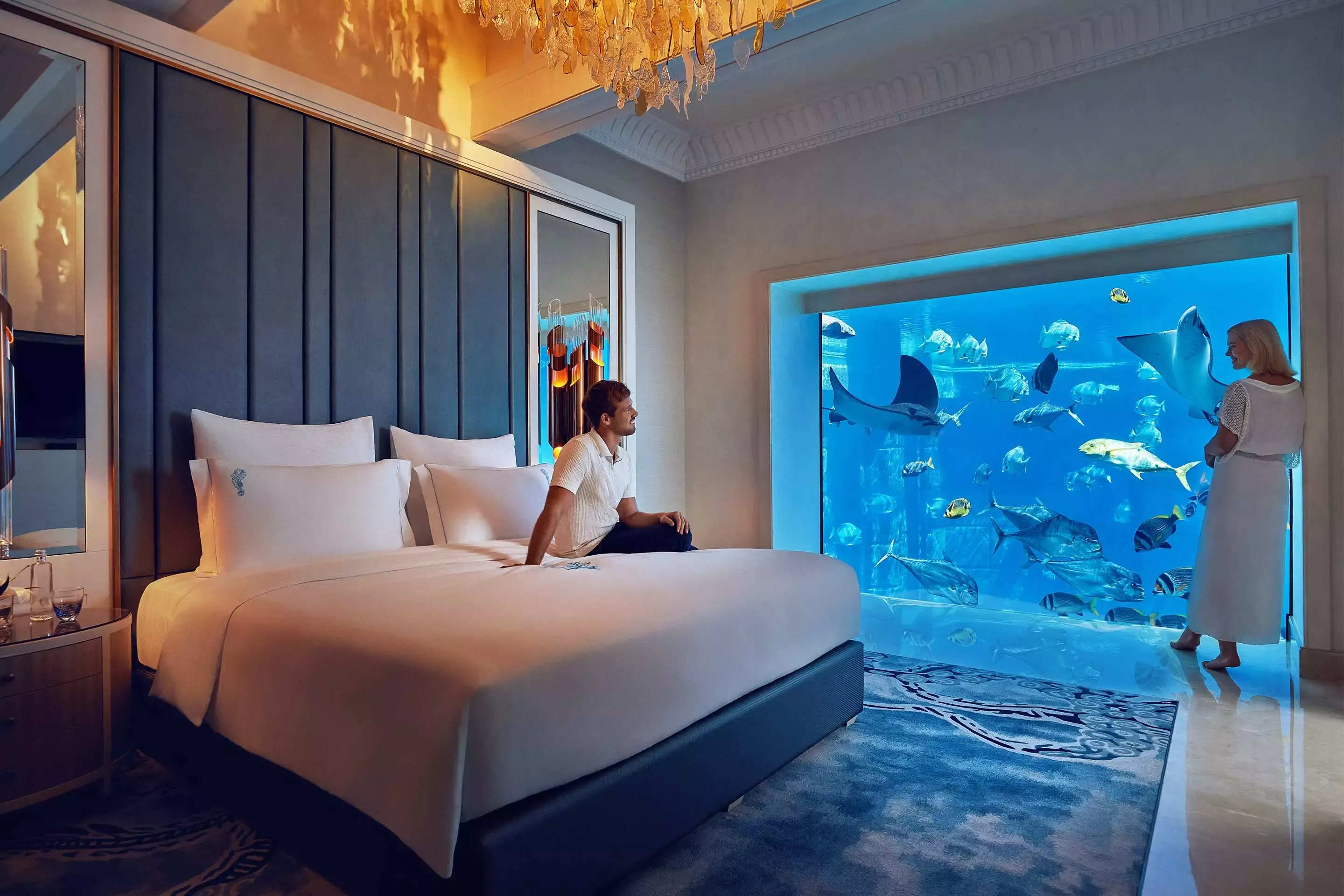 Couple in the Underwater Suite Bedroom at Atlantis The Palm