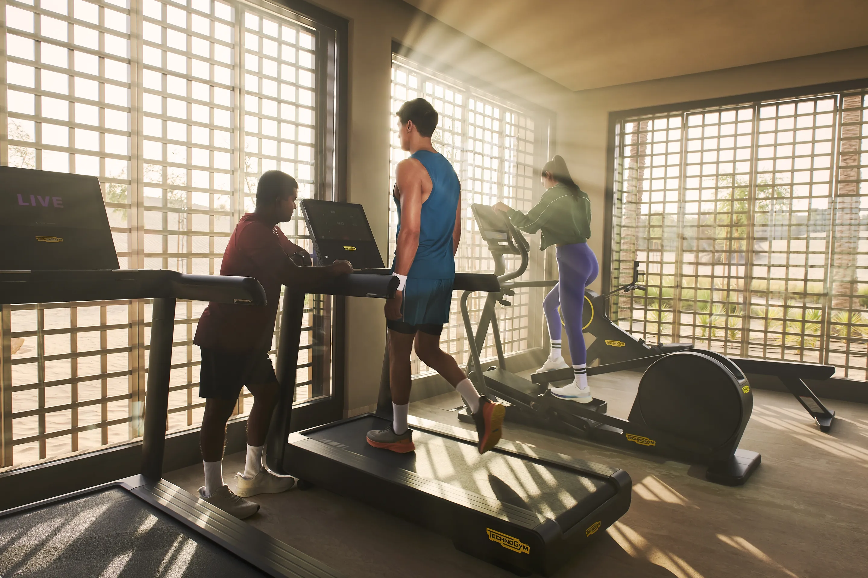People working out in the gym at Bab Al Shams