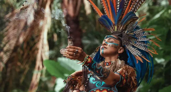 Woman preparing ancient healing rituals at One&Only Mandarina