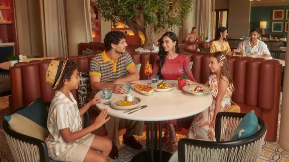 Family enjoying their meal at Zala, Bab Al Shams