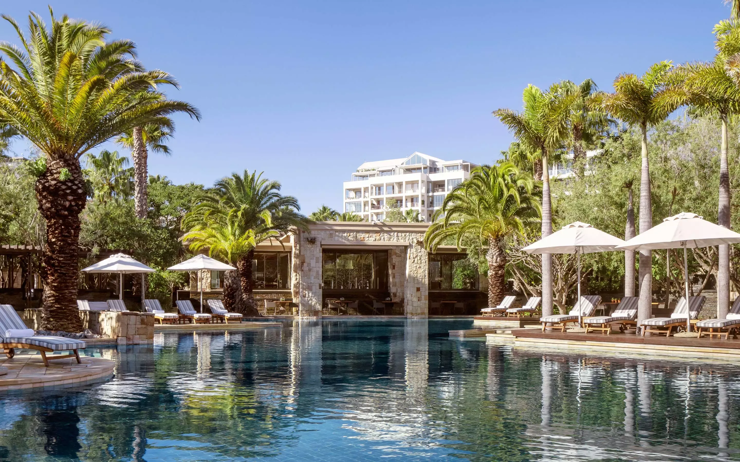 One&Only Cape Town - Relax under the palms at our tranquil pool