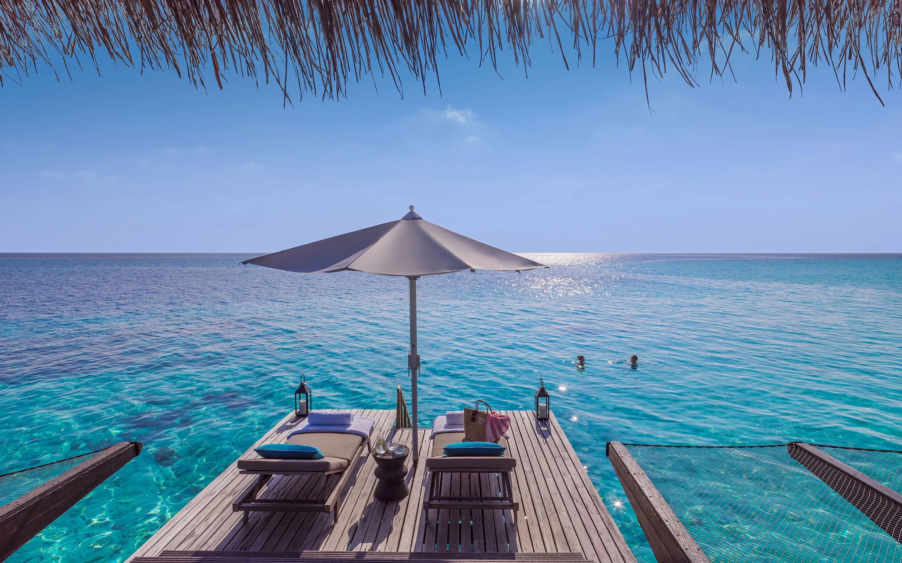 Sun beds near the Ocean at One&Only Reethi Rah