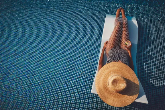 Girl On Pool Lounger at WHITE Beach Dubai