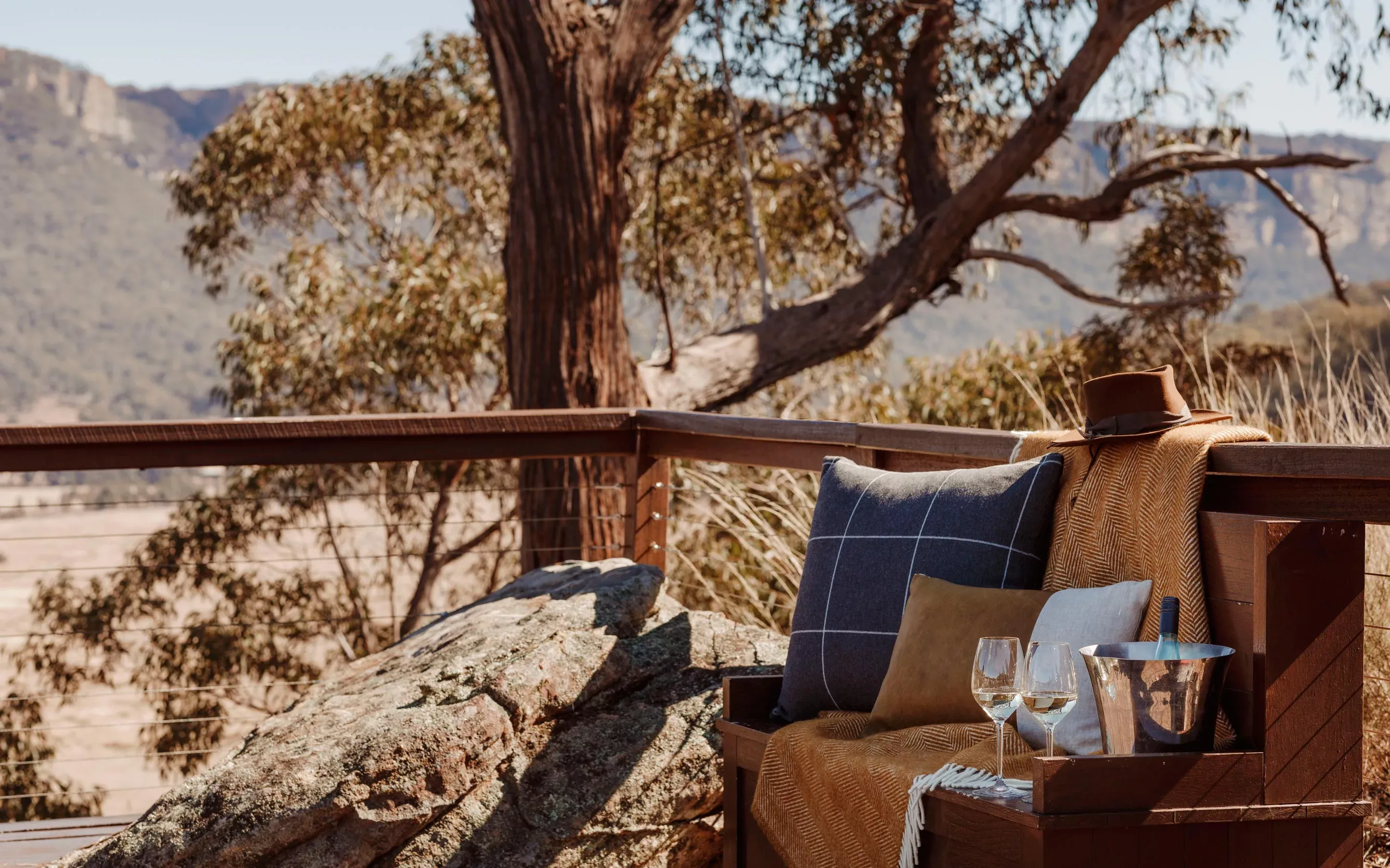 Champagne glasses on the Outdoor Bench at One&Only Wolgan Valley Resort