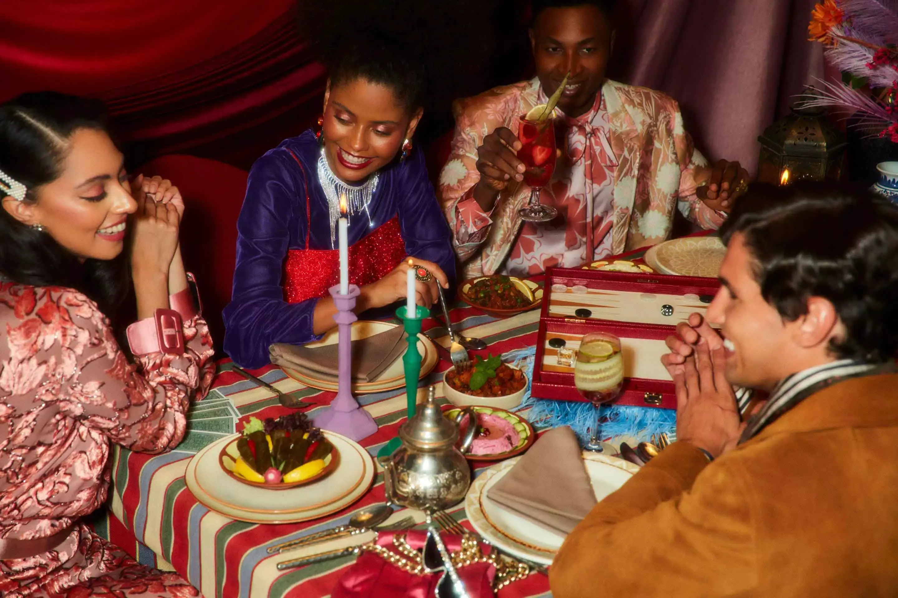 Friends enjoying dinner at Al Hadheerah Restaurants at Bab Al Shams