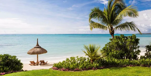 View of the Greenery and sunbeds on the beach at One&Only Le Saint Géran