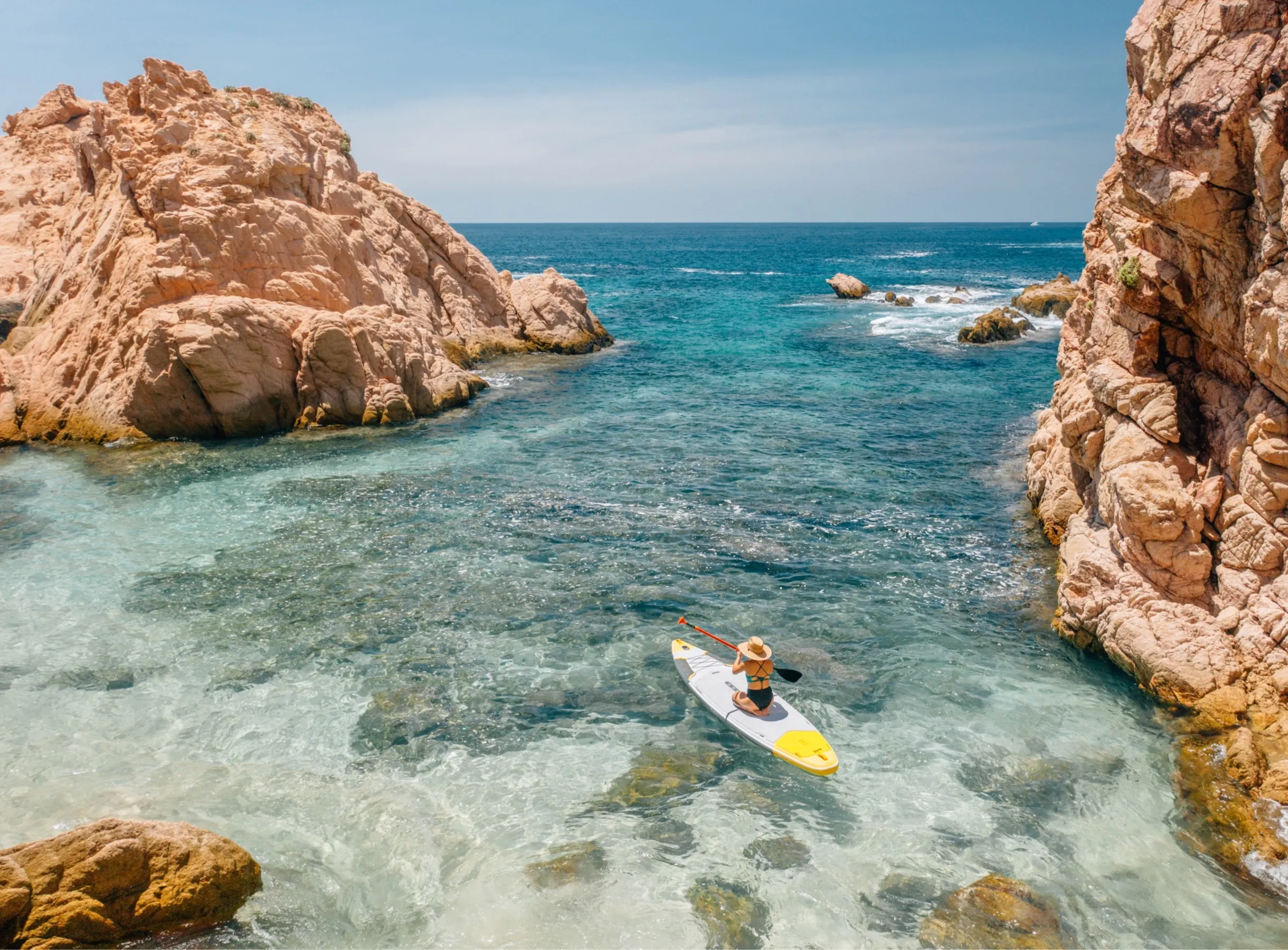 A woman paddleboarding at One&Only Palmilla in Mexico