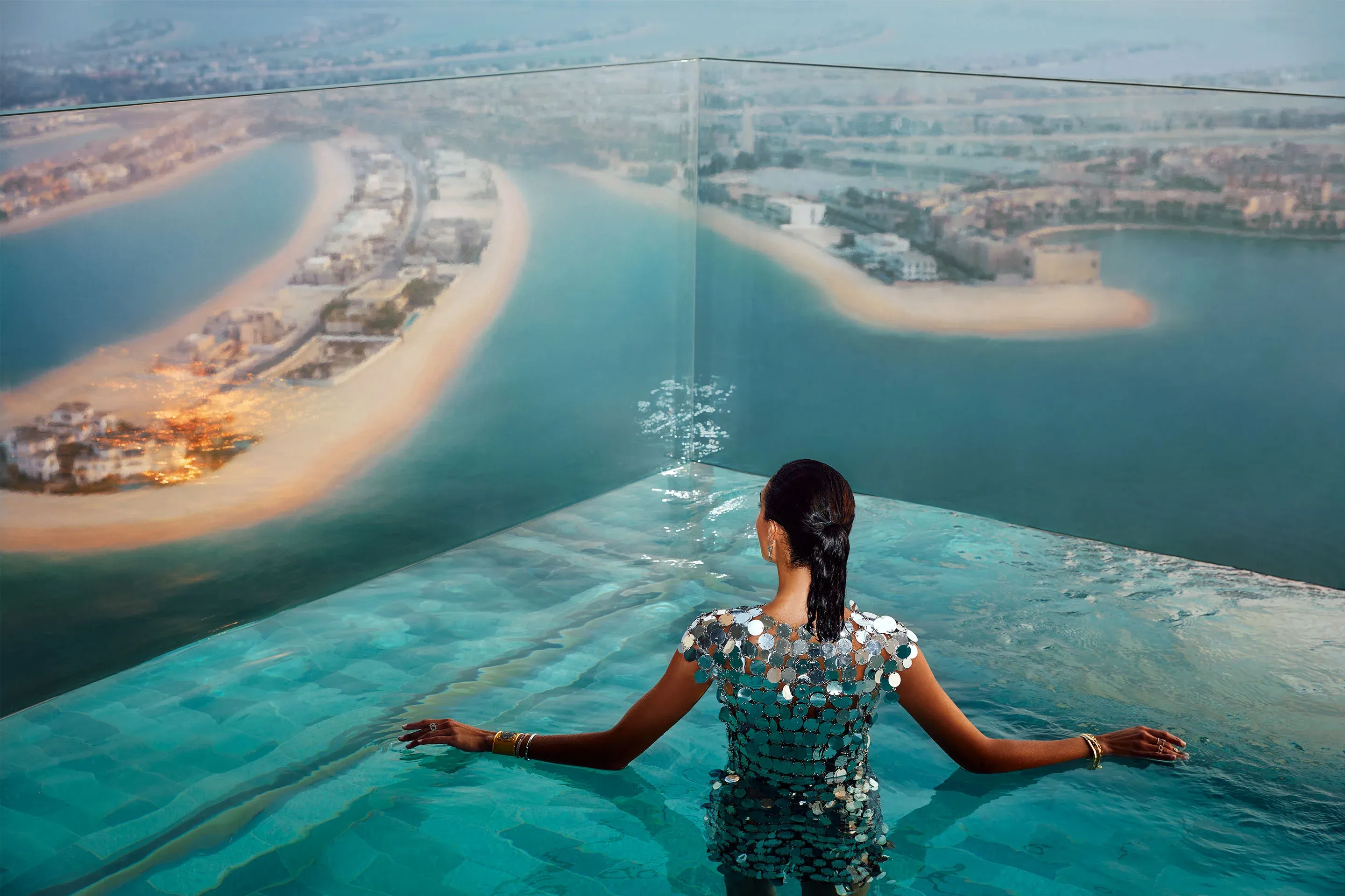 Girl Swimming in the Sky Pool Villa at Atlantis the Royal