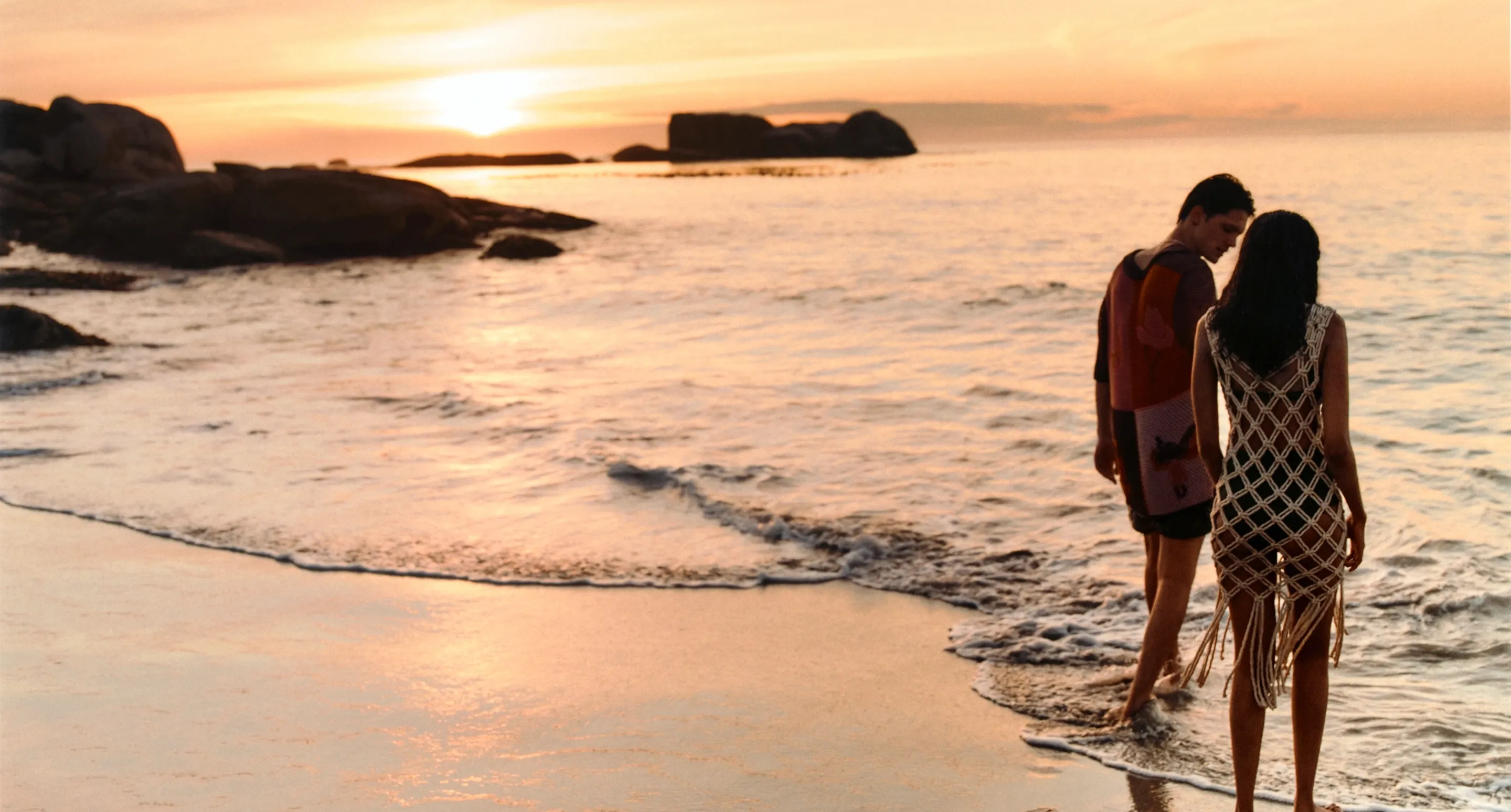 Couple at Clifton Beach during Sunset from One&Only Cape Town