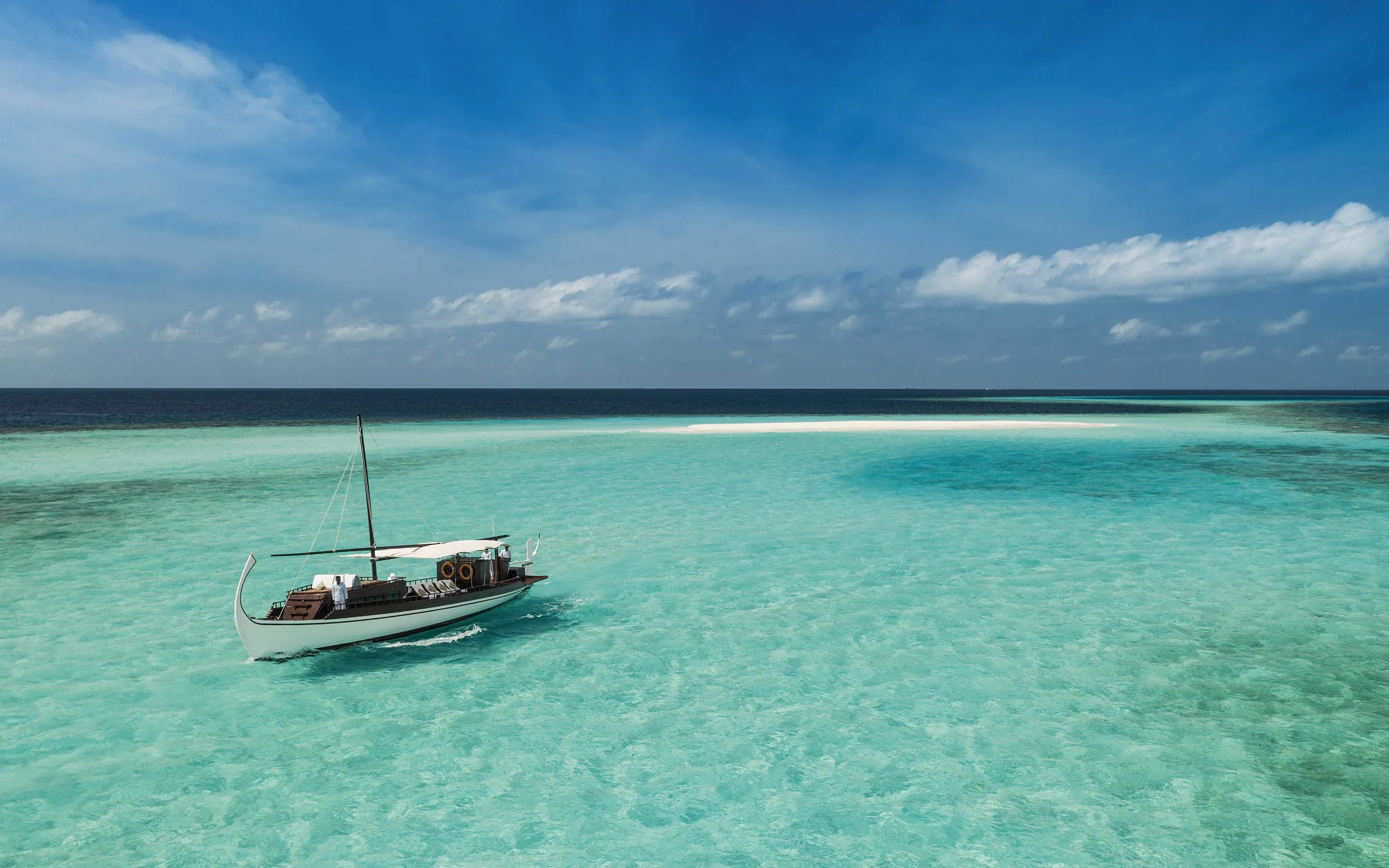 Boat & Beach Sandbank at One&Only Reethi Rah