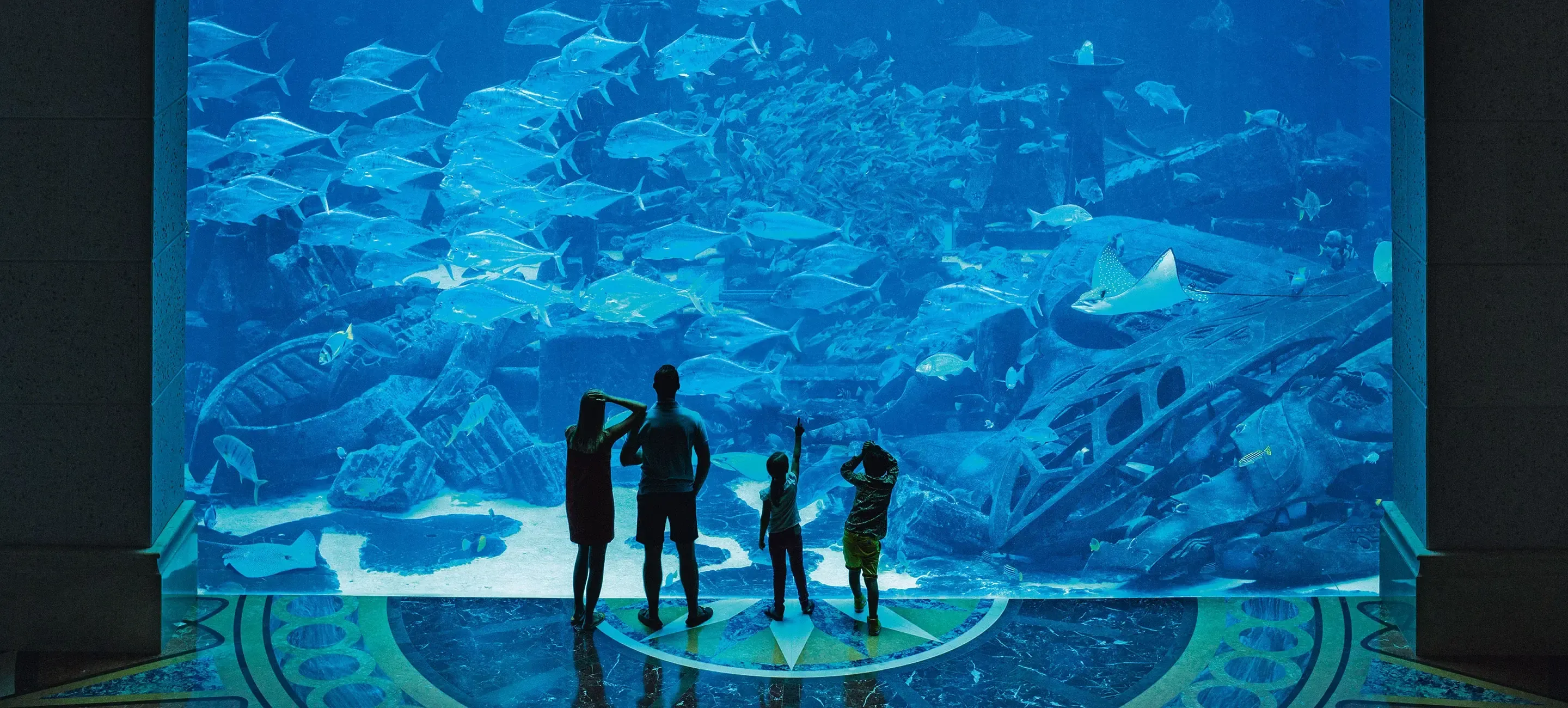 Family at Ambassador Lagoon in Atlantis The Palm