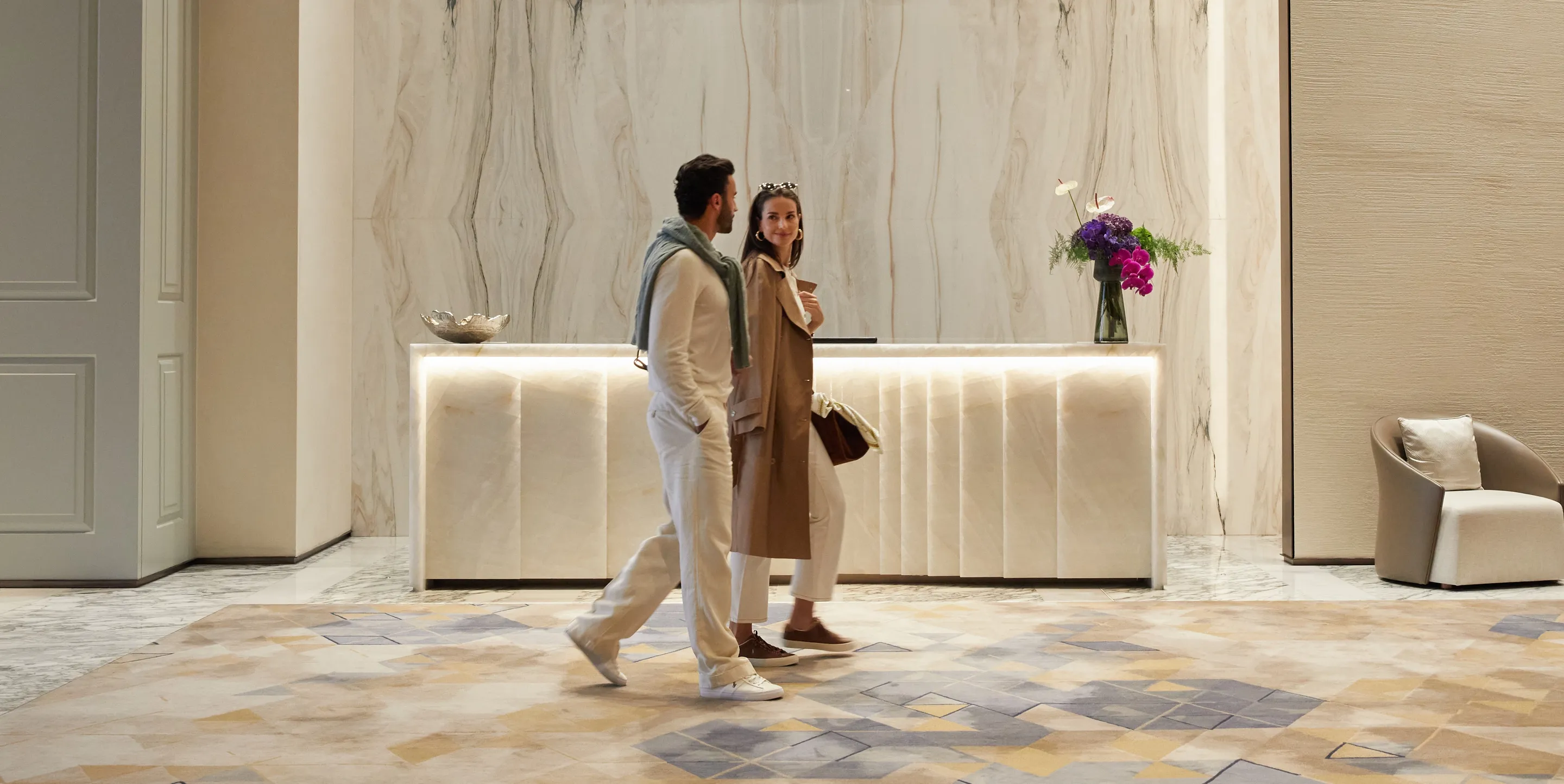 Two guests entering Porte Cochère at One&Only One Za'abeel