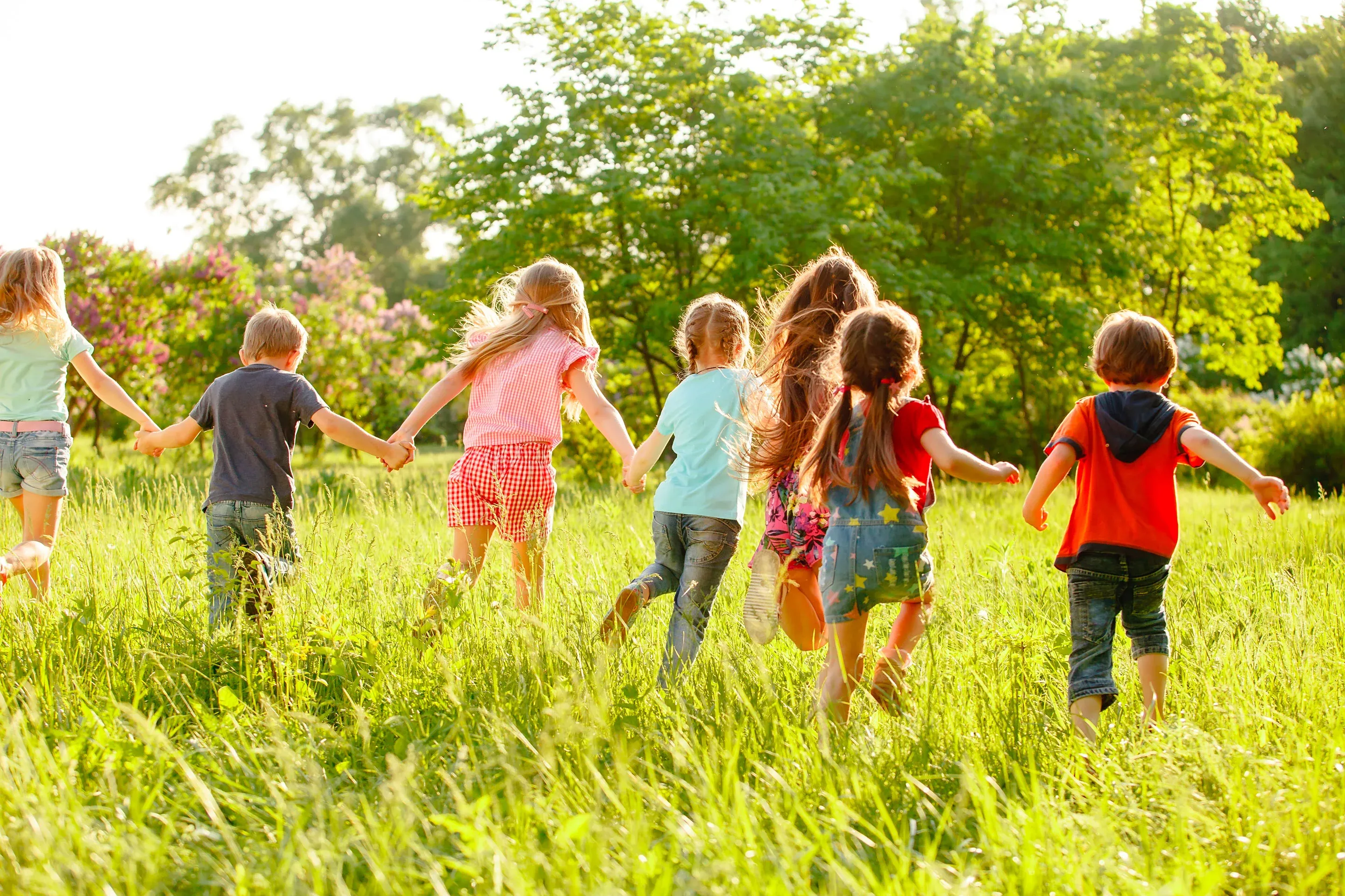 group-children-playing-running-park-green-gozon.jpg
