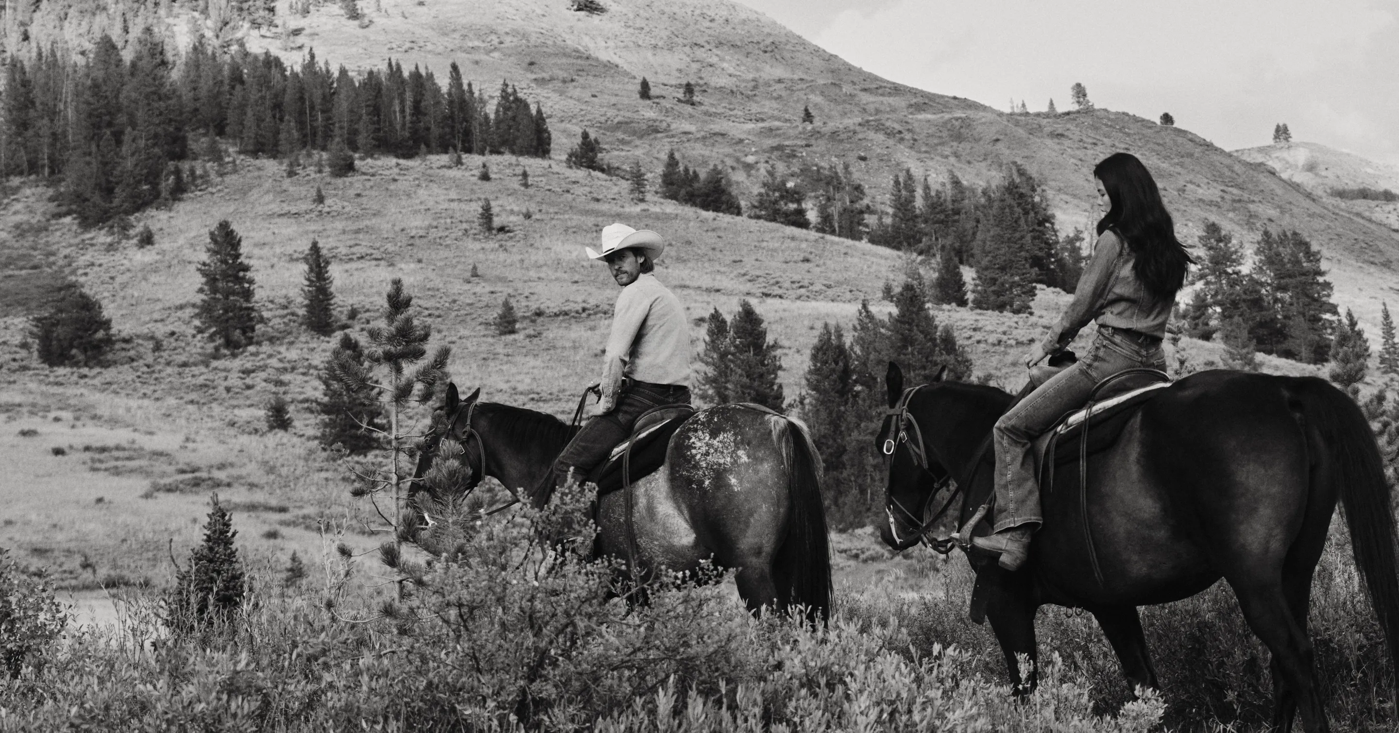 Couple riding horses at One&Only Moonlight Basin