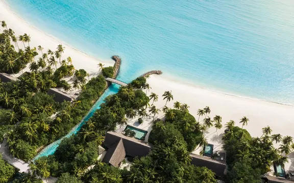 Aerial view of the beach villas at One&Only Reethi Rah