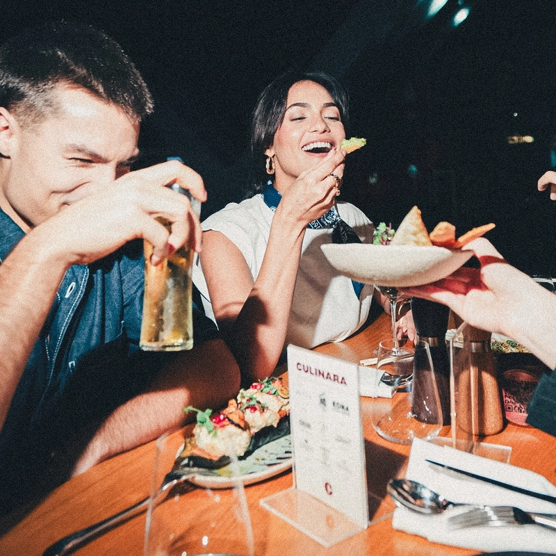 group of people enjoying dining at culinara