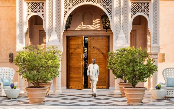 Man standing at the main entrance of One&Only The Palm Dubai