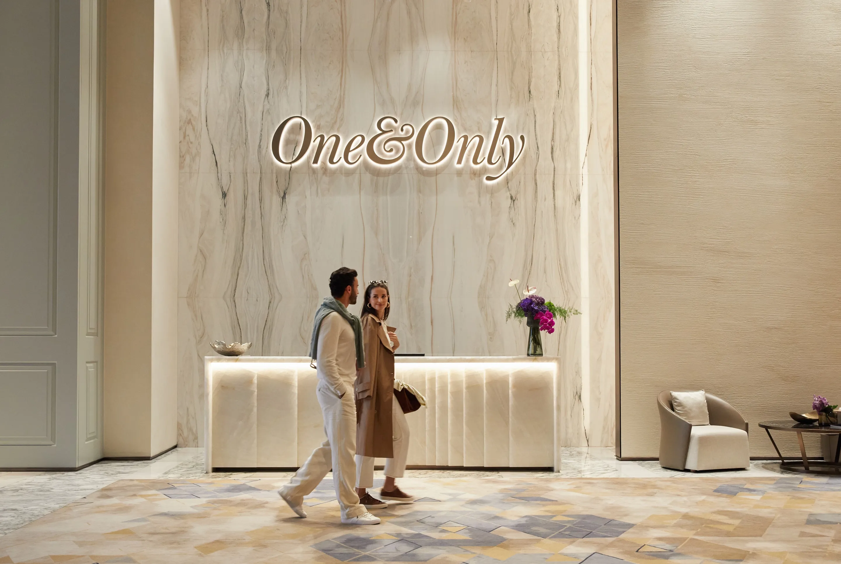 Two guests entering Porte Cochère at One&Only One Za'abeel