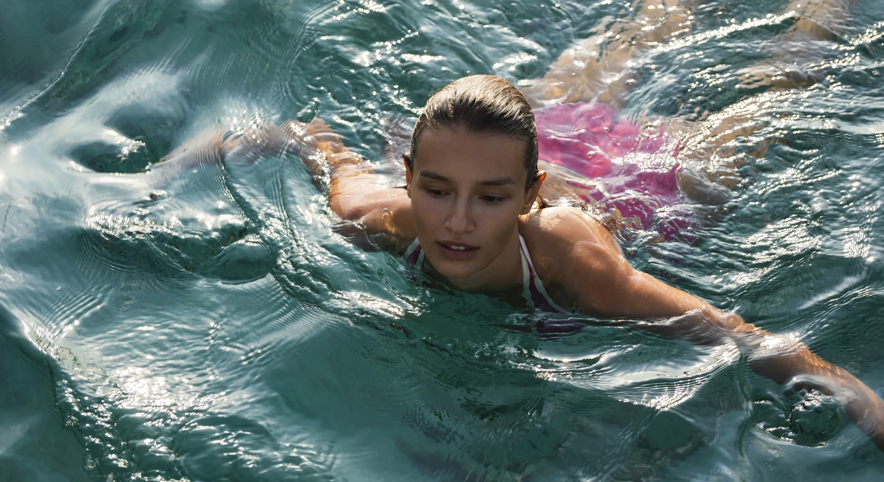 Woman Swimming at One&Only Kéa Island