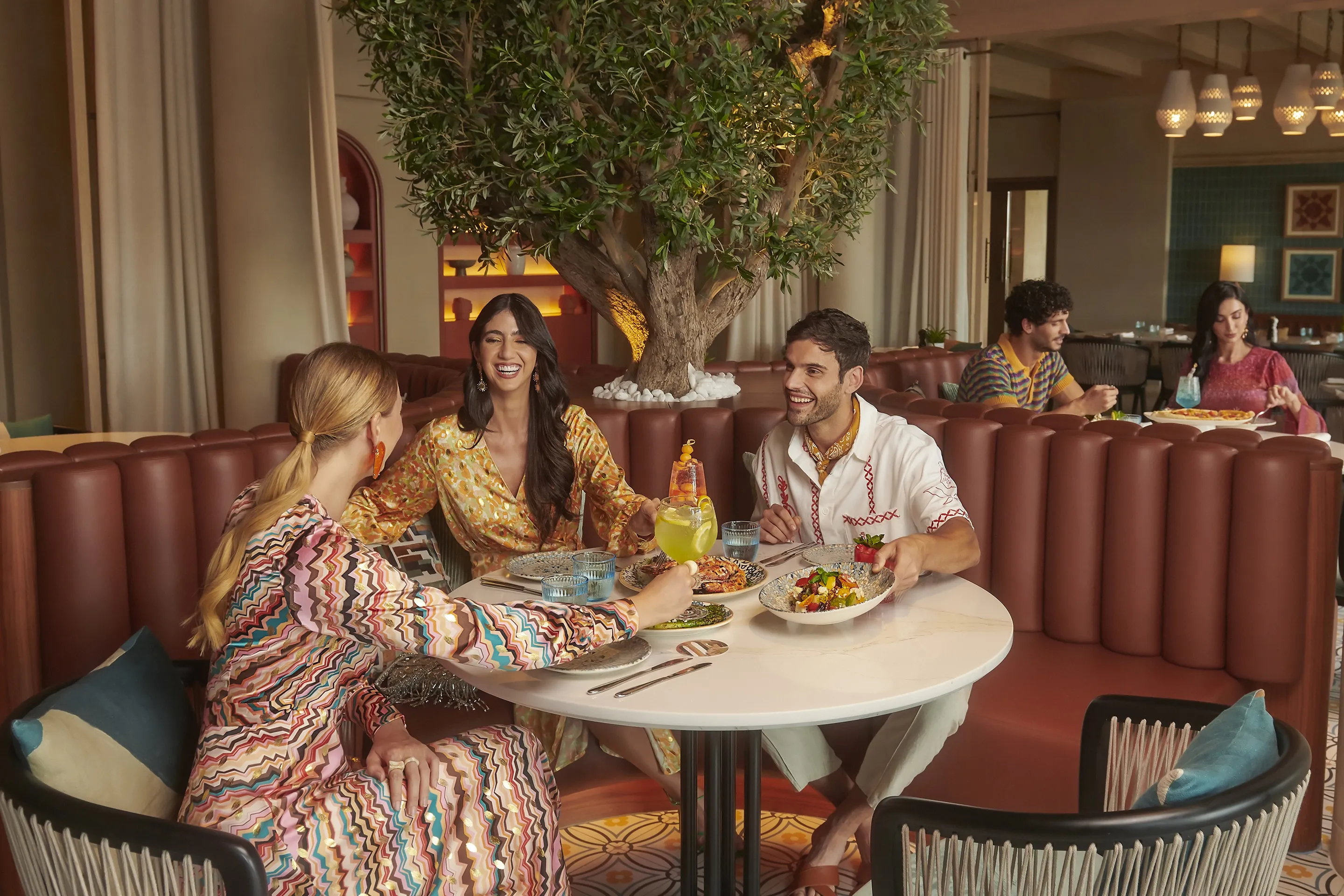 Friends enjoying their meal at Bab Al Shams