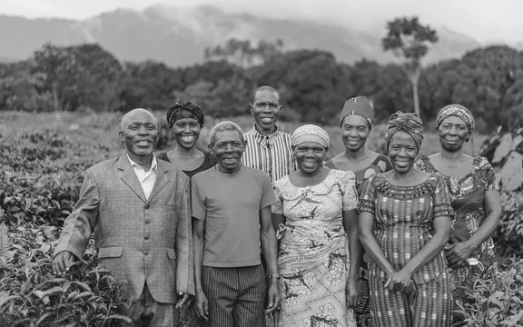 A group of people smiling at One&Only Nyungwe House