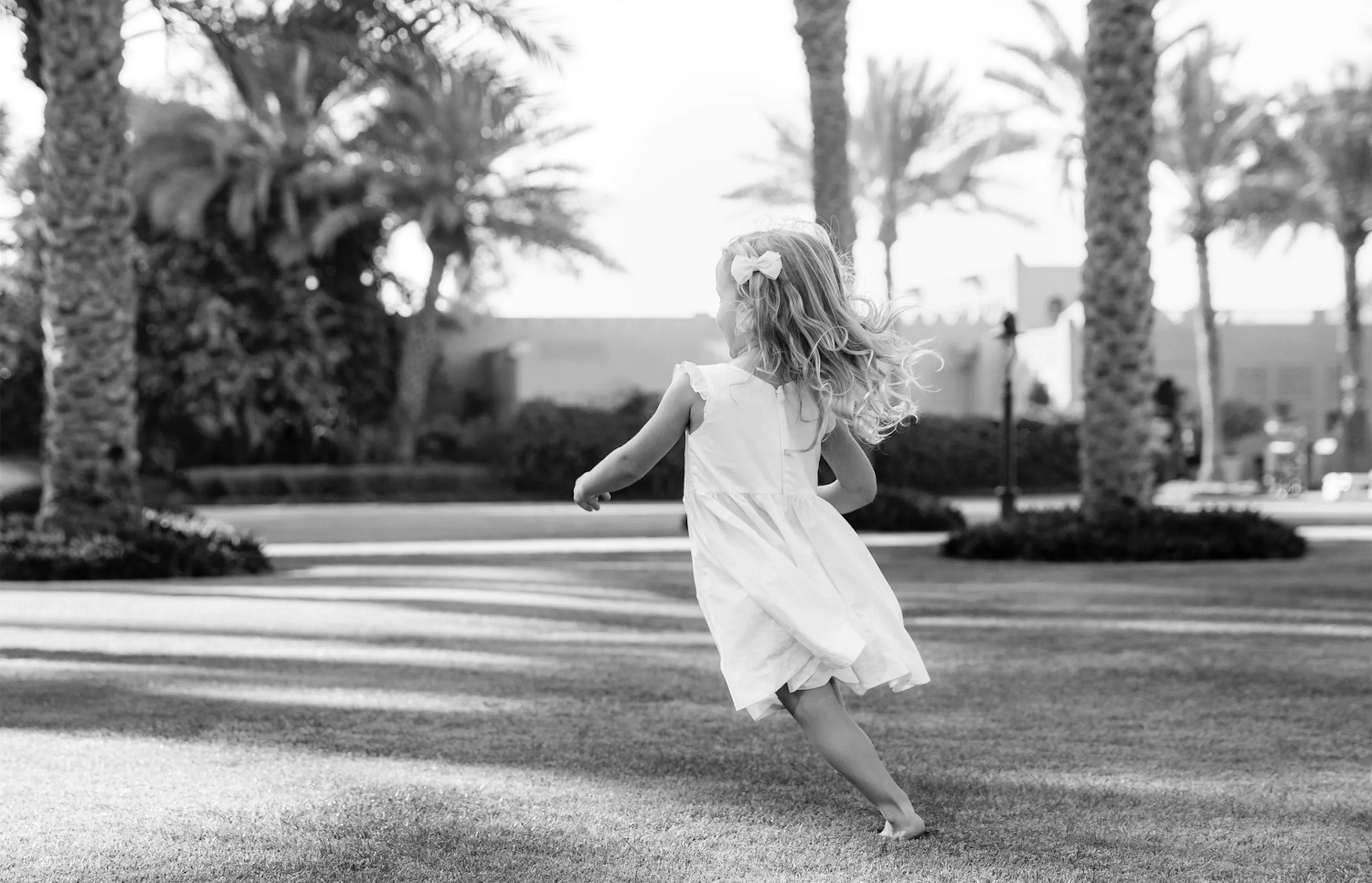 A little girl running around at One&Only Royal Mirage