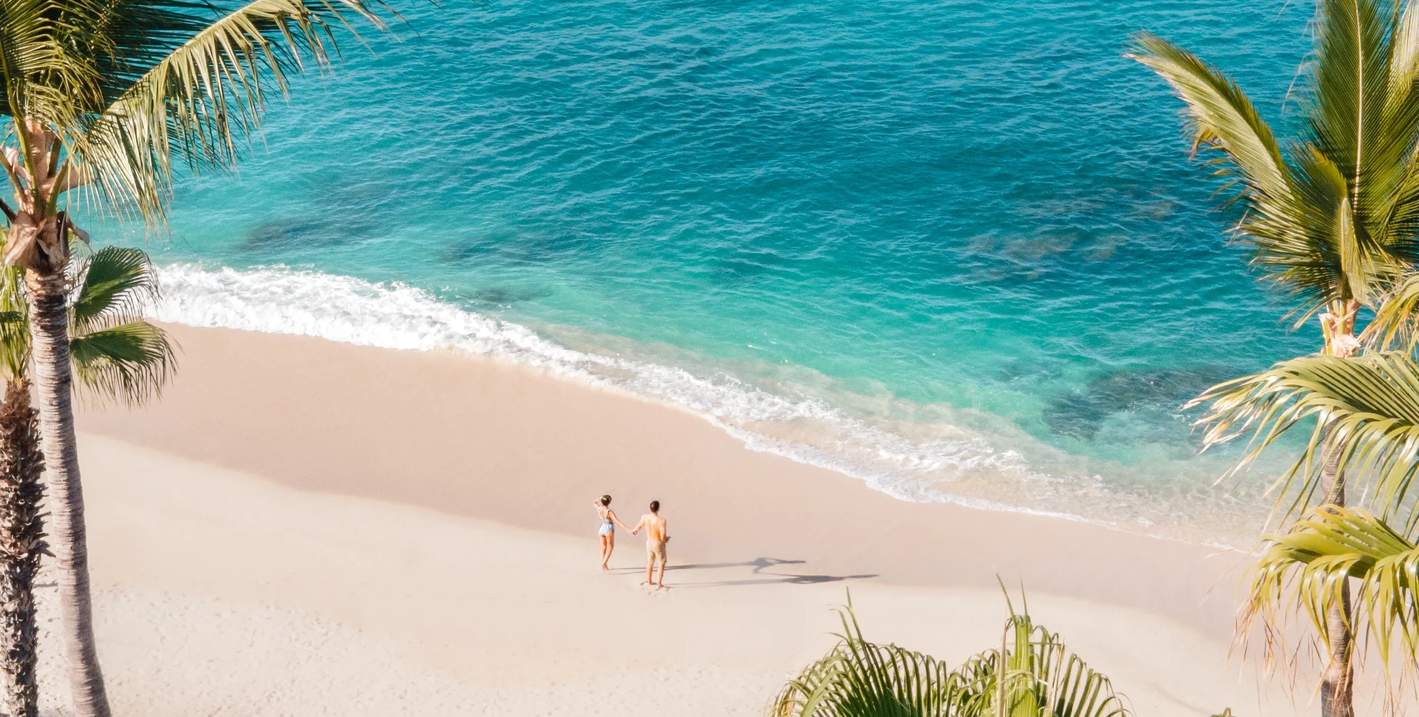 Couple at the beach at One&Only Palmilla