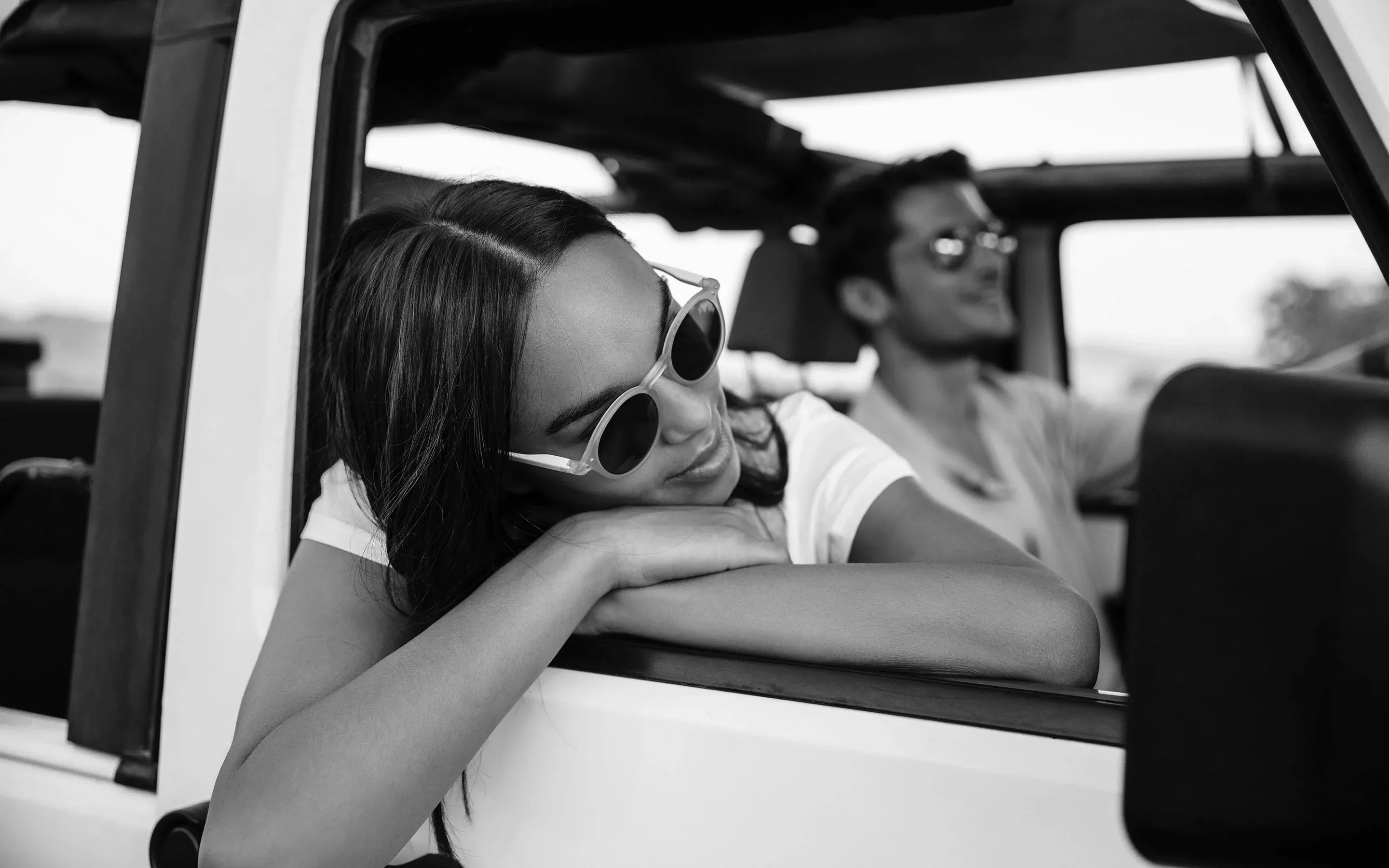 Woman wearing sunglasses in the car at One&Only Mandarina