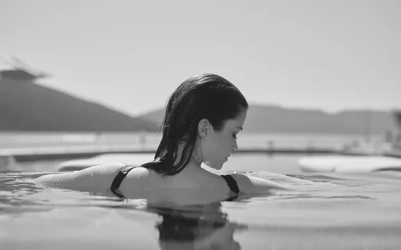 Woman in Pool | One&Only Portonovi