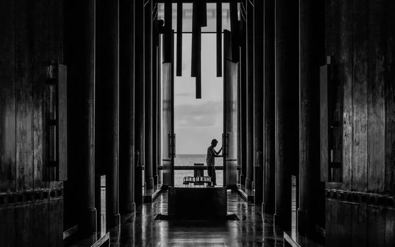 A man opening the door at One&Only resorts